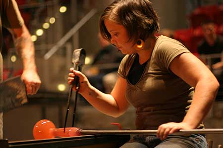 Photo of a glass artist at work