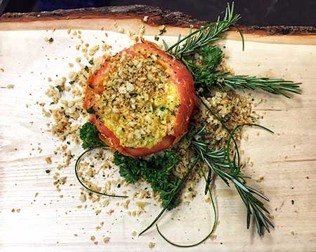 Photo of a stuffed tomato entree